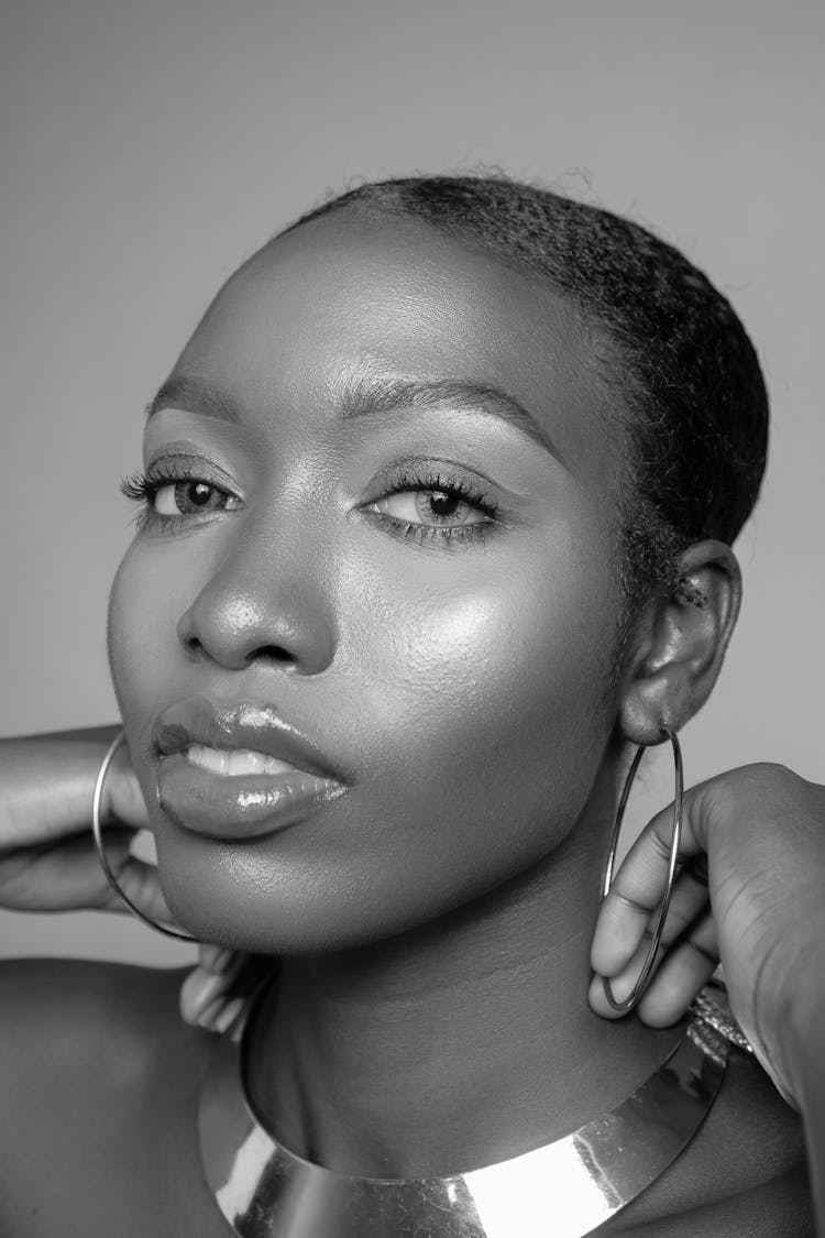 Confident African American Female With Accessories In Studio