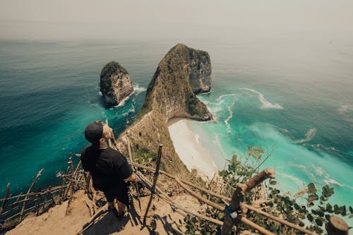 A Man Standing on a Cliff