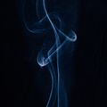 Signal Fade album art — blue smoke on black, photo by Sebastien Dottin on Pexels