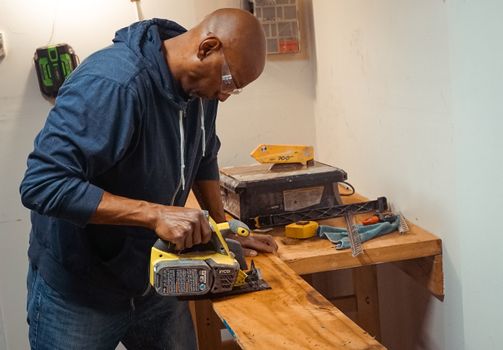Man Working with Grinder