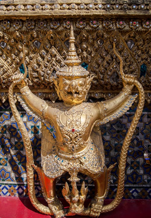 A Metallic Statue in a Temple