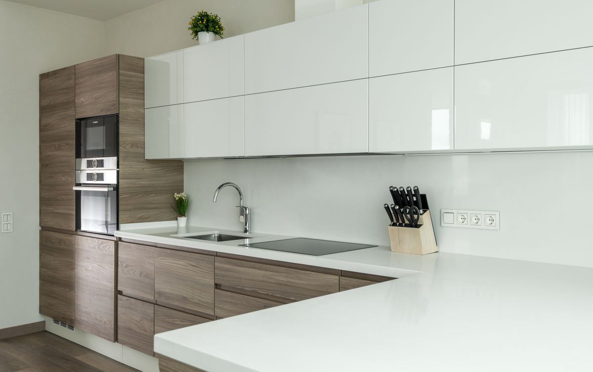 Modern kitchen with white and wooden cabinets