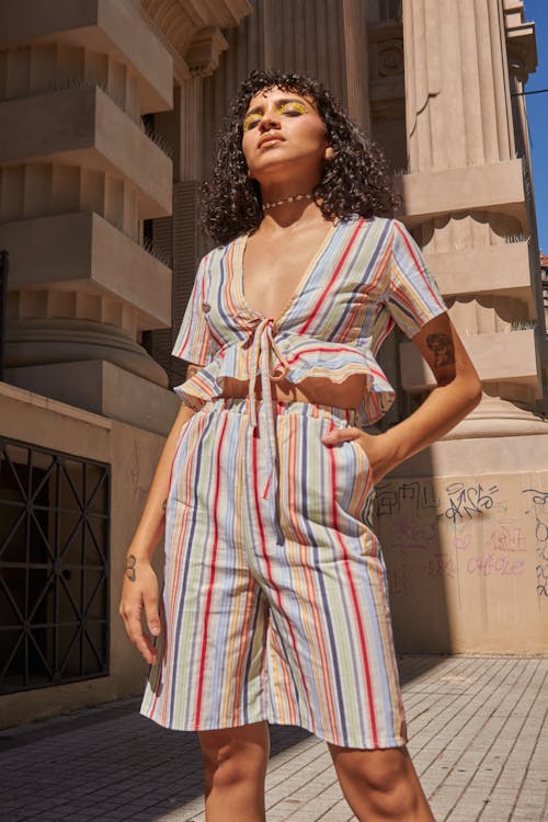 Low-Angle Shot of a Beautiful Model Posing with Her Hand in Her Pocket