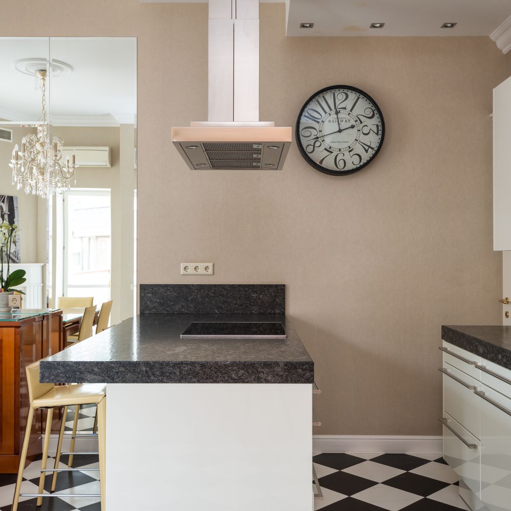 Kitchen Spraying in Beddington — dust sheets down and the room fully protected