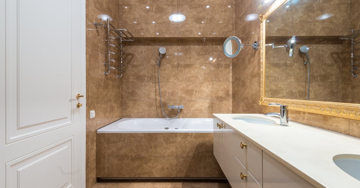 Bathroom interior with bathtub and sinks under mirror