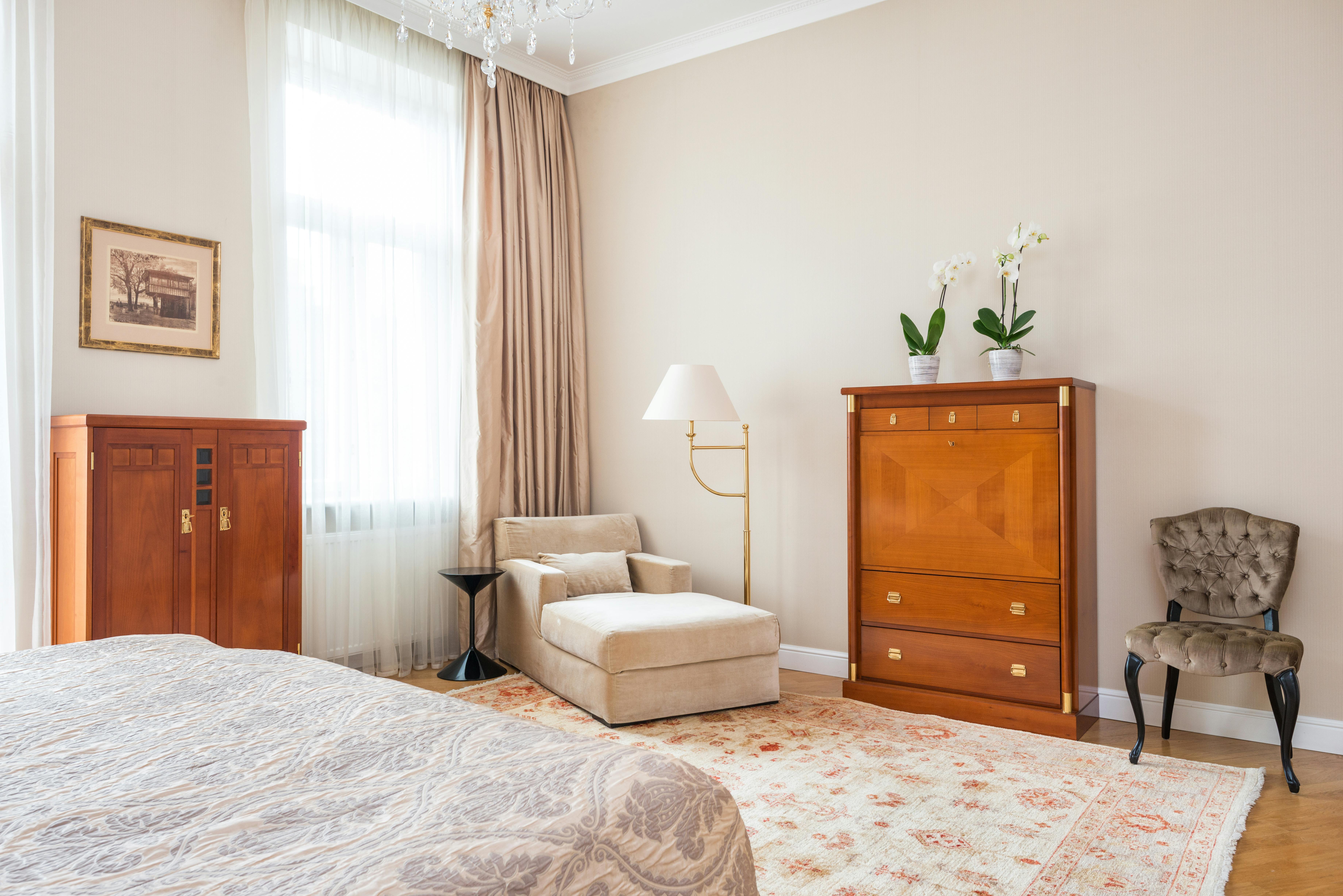 bedroom interior with bed and classic furniture