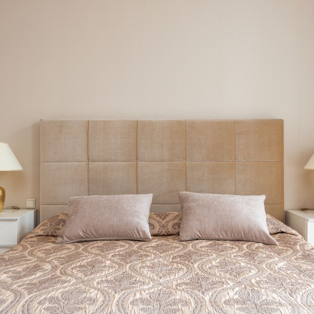 Wallpapering in The Hale — woodwork brushed to a crisp, smooth line