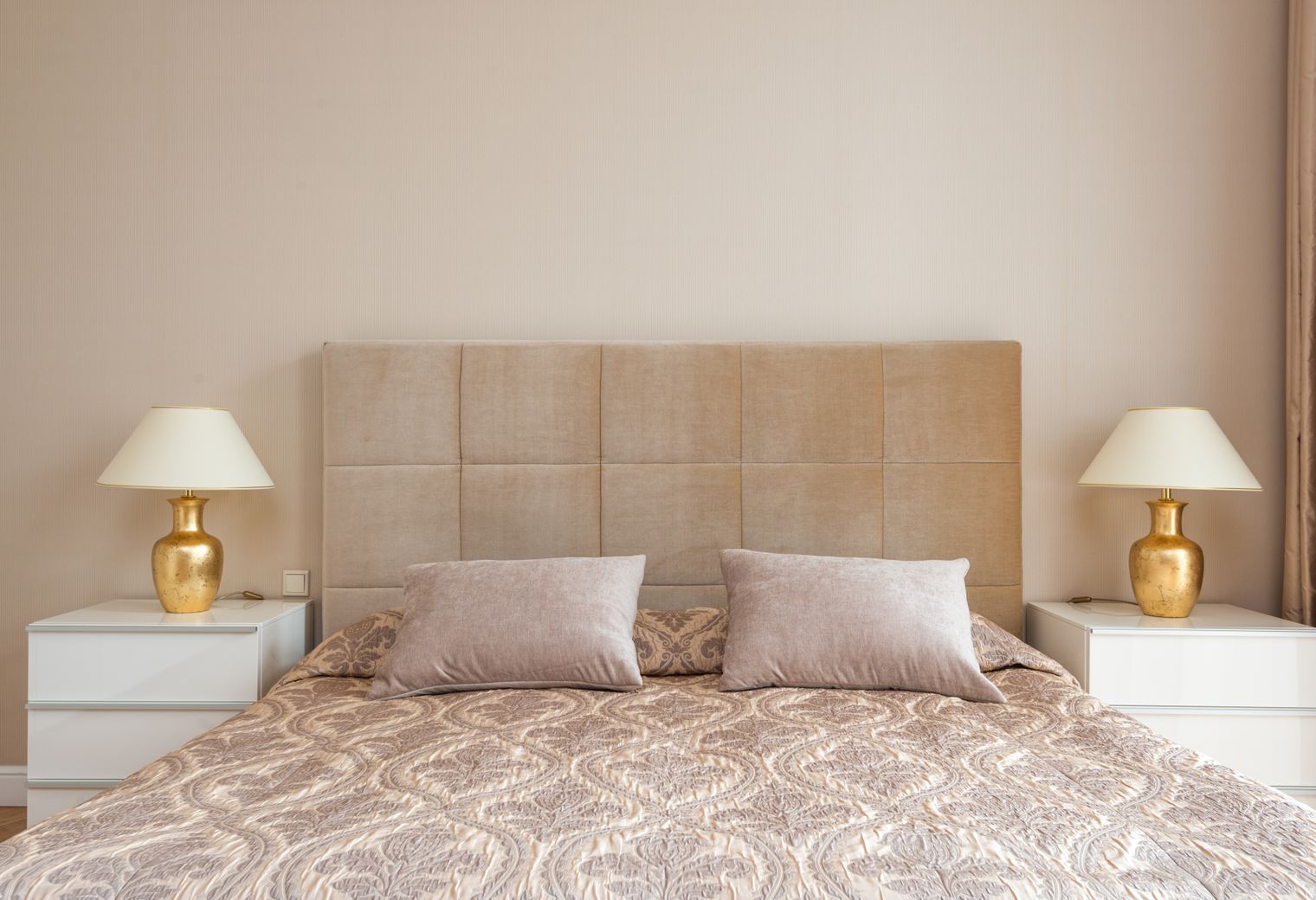 Wallpapering in Cheam — clean edges cut in around trim and sockets