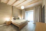 Bedroom interior with big windows on mansard