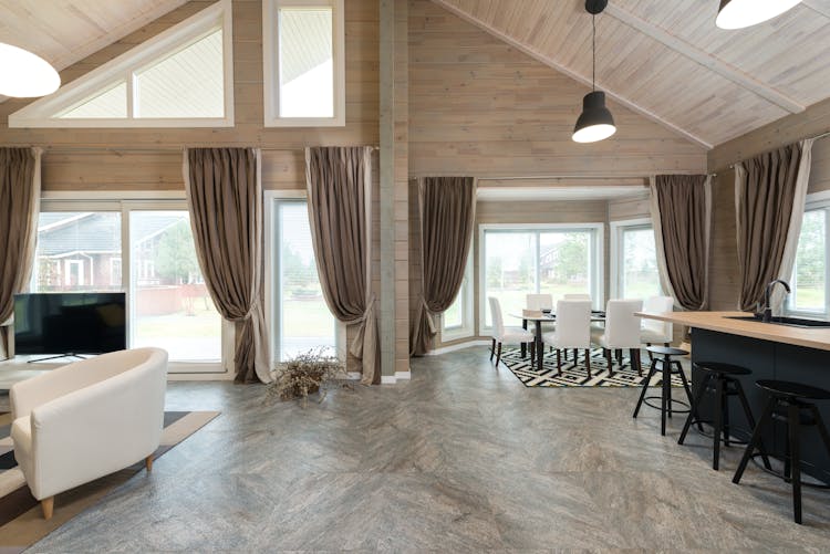 Interior Of Spacious Private House With Pitched Roof