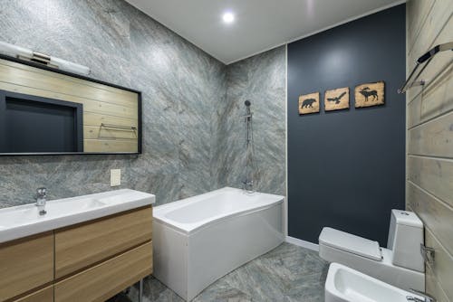 Interior of bathroom with mirror above sink