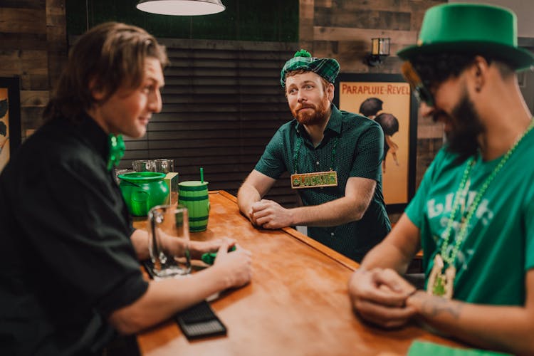 A People Talking On The Bar 