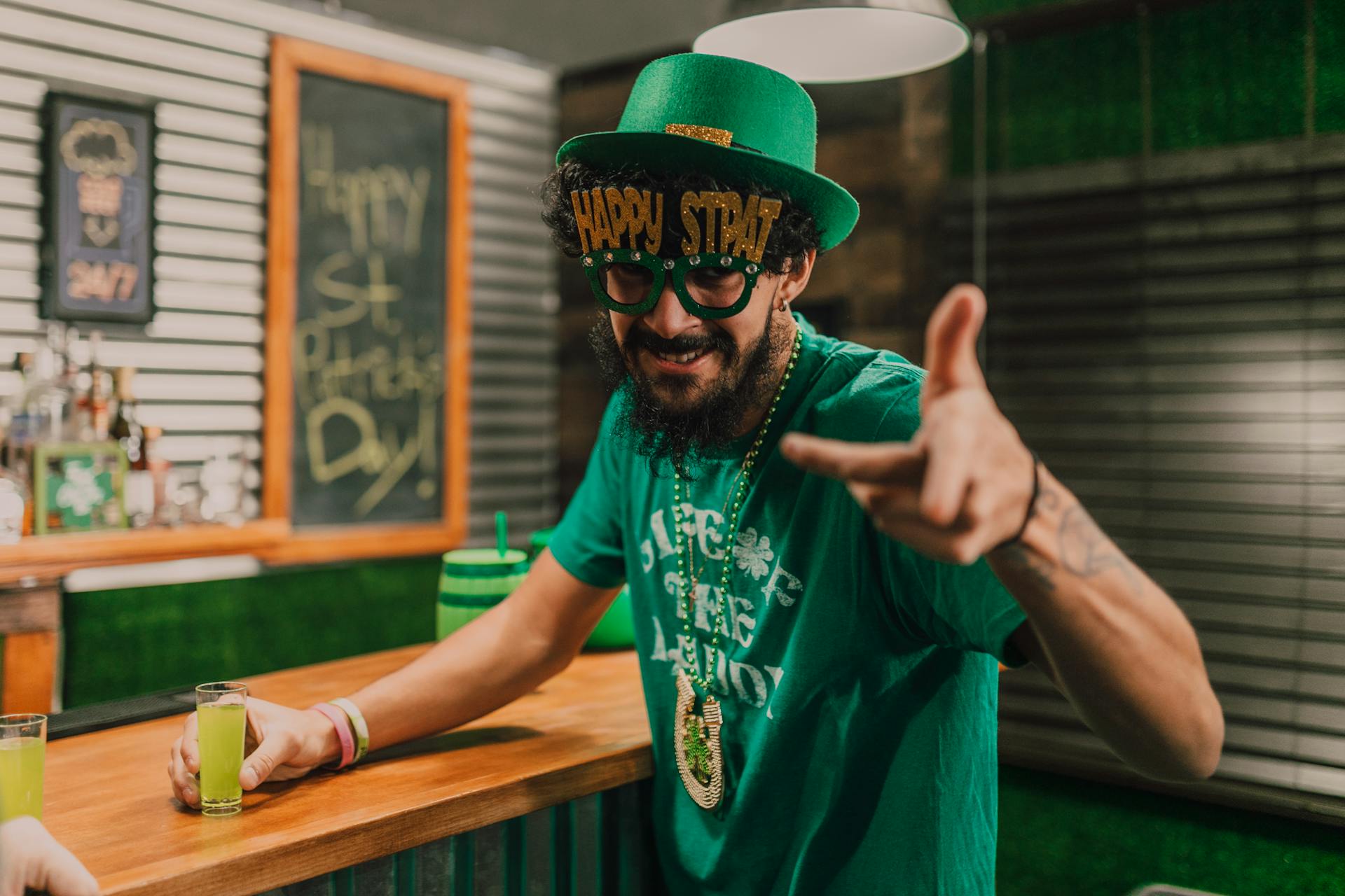 A Man Wearing Green Hat with Happy St Patrick's Day Eyeglasses