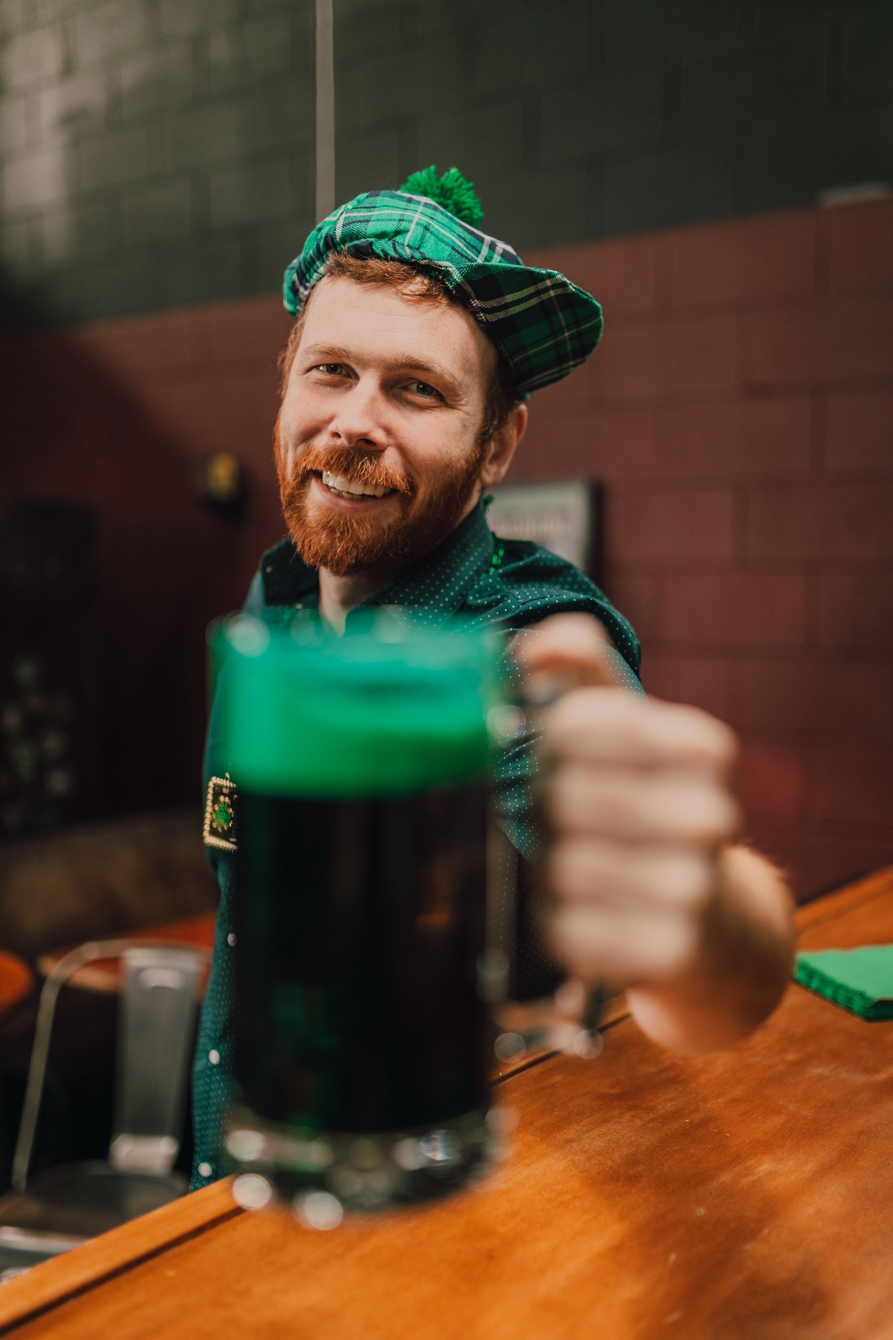 A Man Holding a Mug of Beer · Free Stock Photo