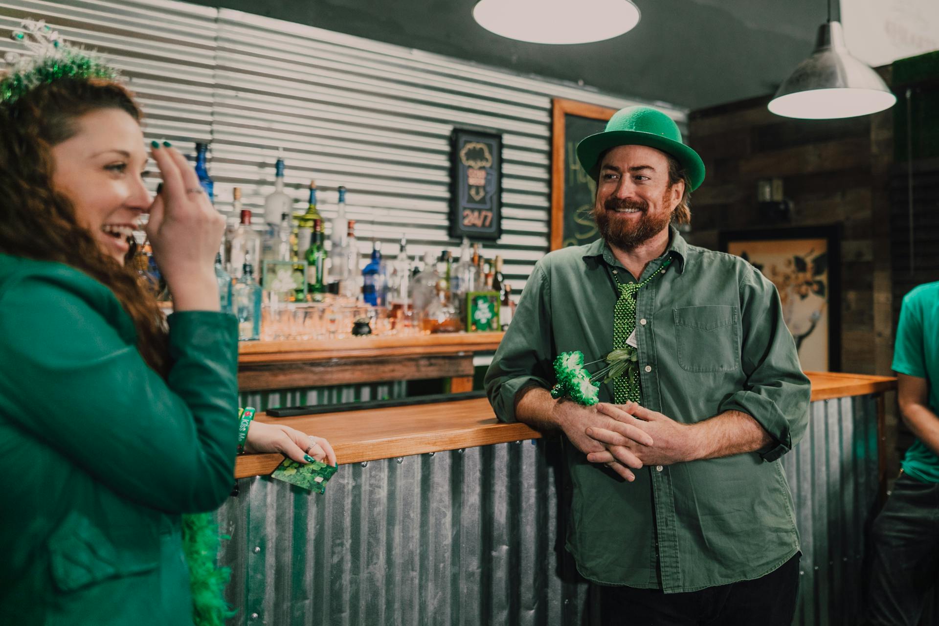 People Celebrating St Patrick's Day in a Bar