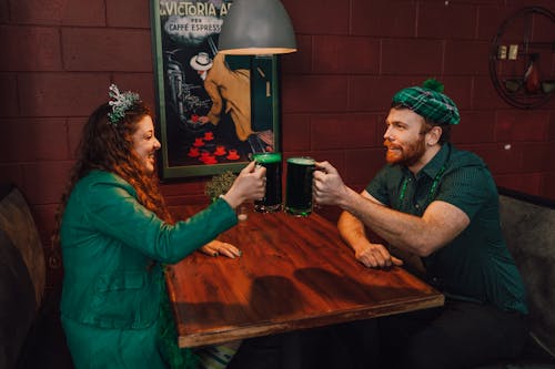 Couple Toasting Alcoholic Drinks