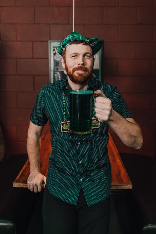 Man Holding a Beer Mug