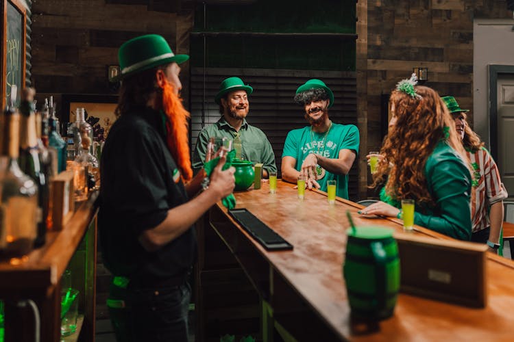 People In Green Outfit Enjoying The Party