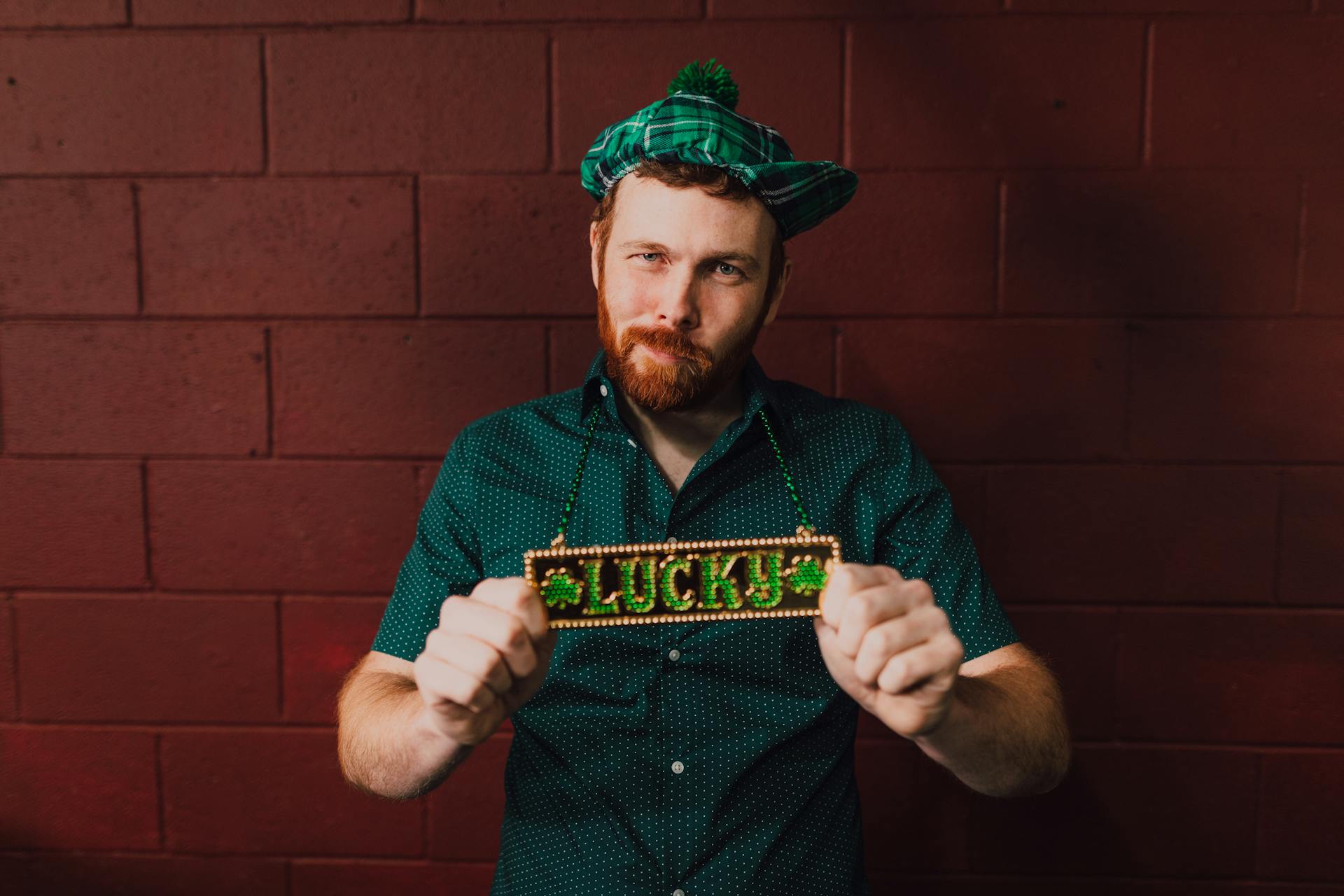 A Man Wearing a Tag with the Word Lucky