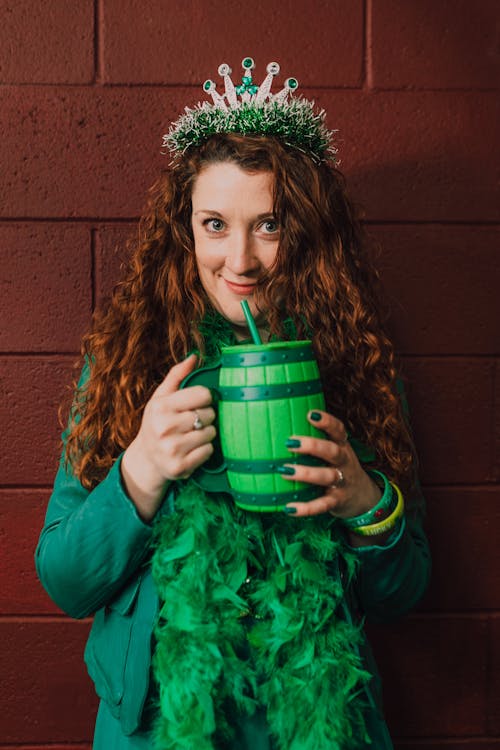 Woman Holding a Green Barrel Mug