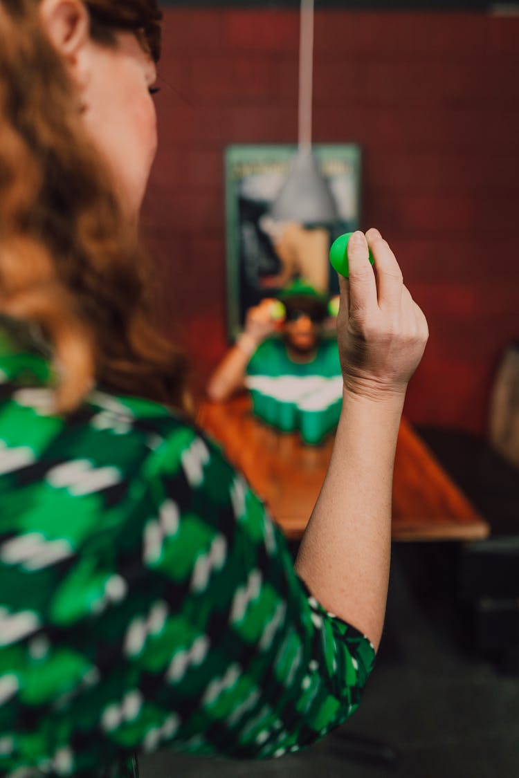 People Playing Parlor Games In Celebration Of St Patrick's Day