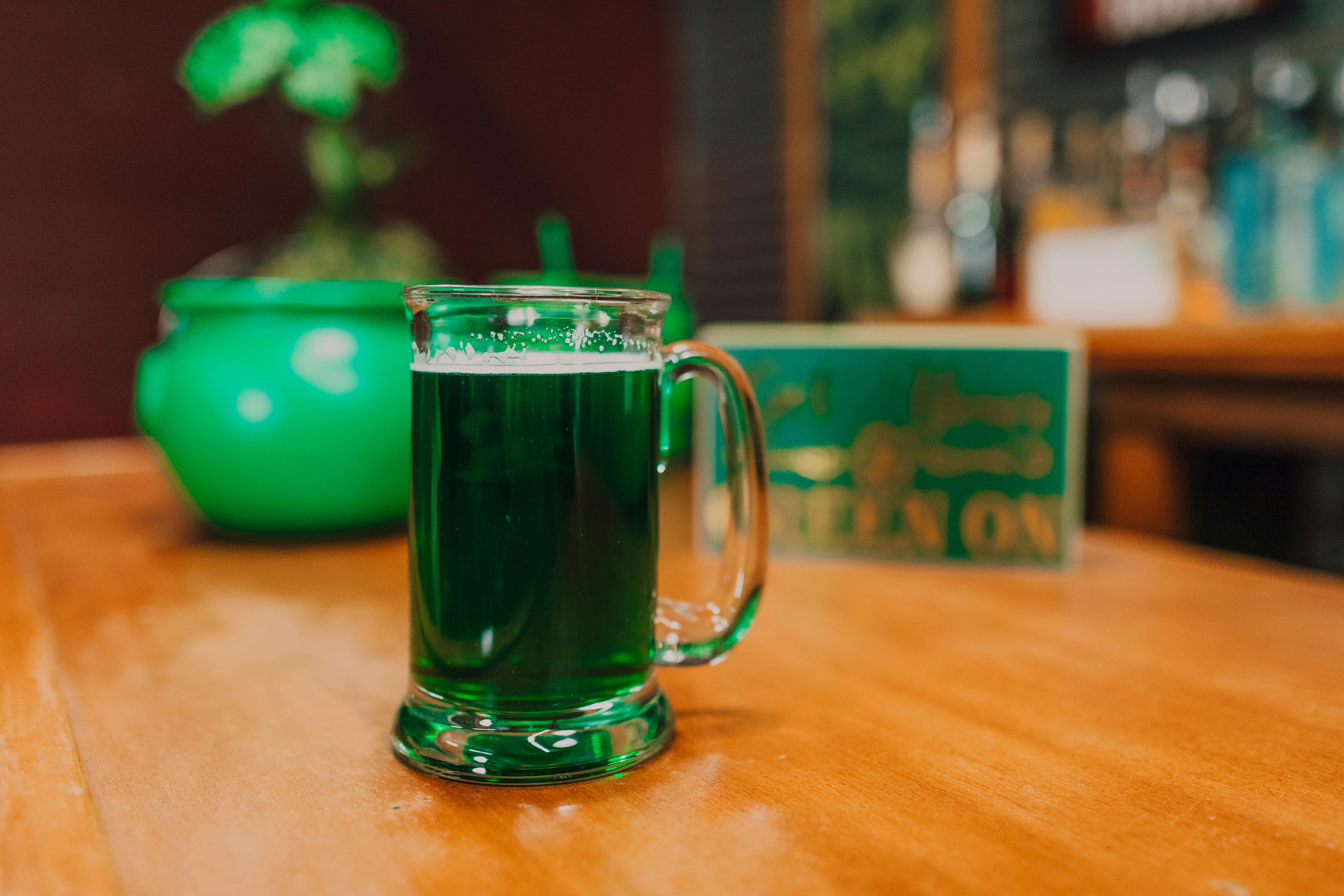 glass mug with green liquid