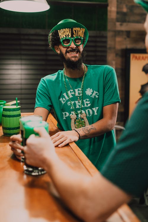 Bearded Man Wearing a Green Hat 