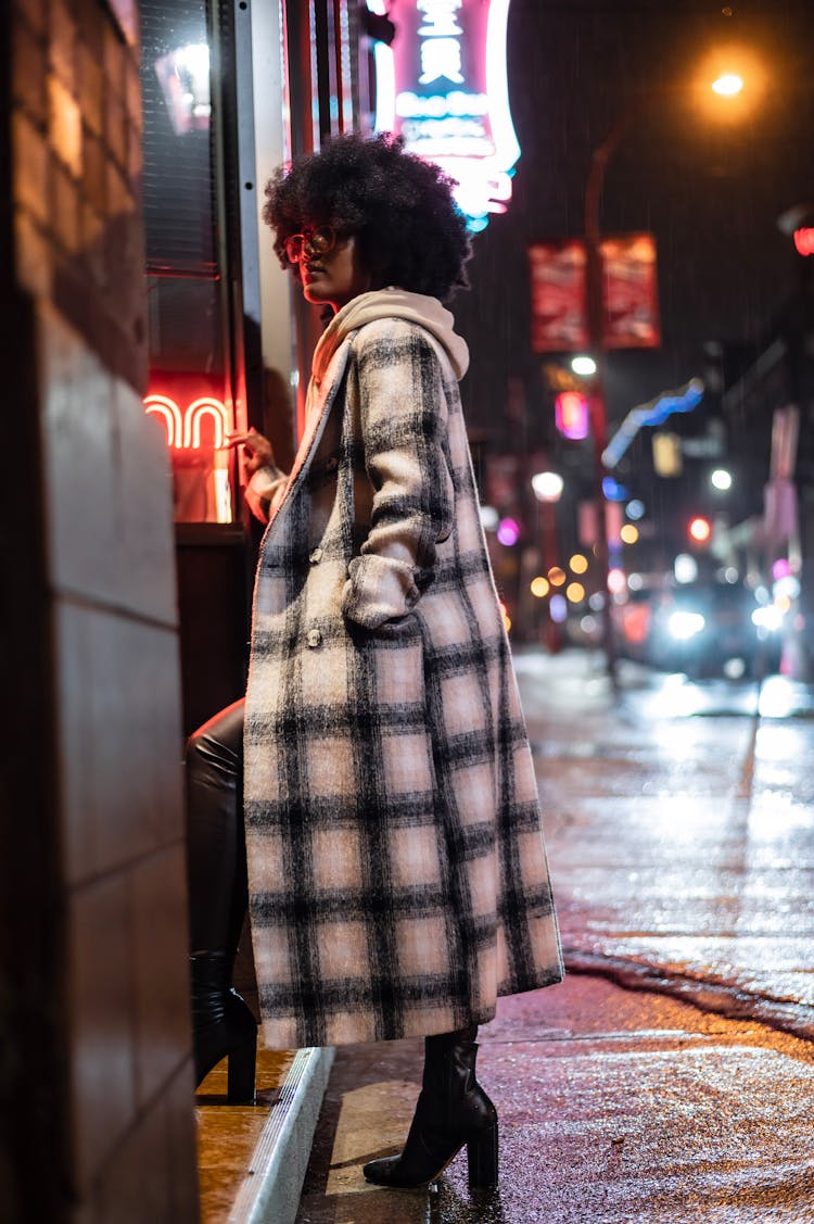 Fashionable Black Woman On Dark Street Near Road