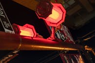 Signpost with decorative lanterns in evening town