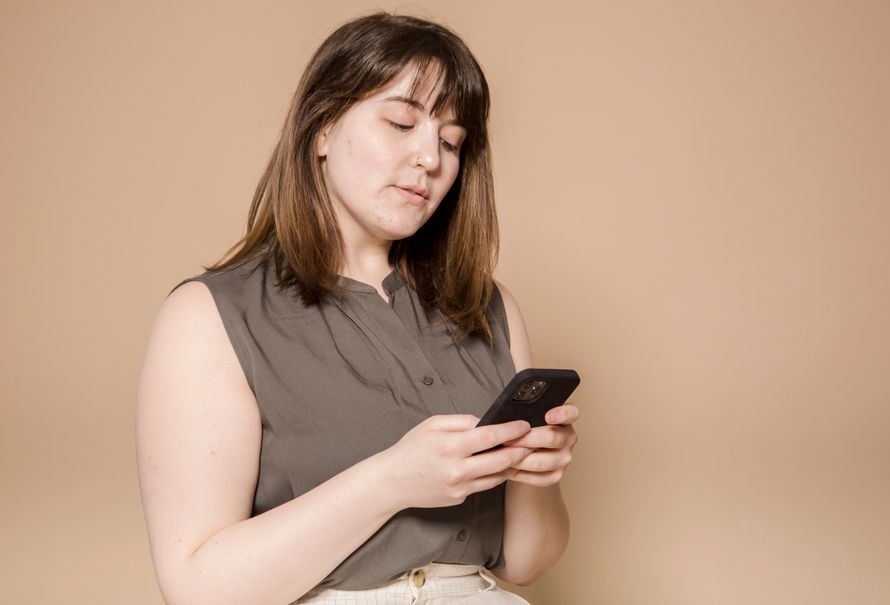 mature couple enjoying coffee together while using dating app on tablet