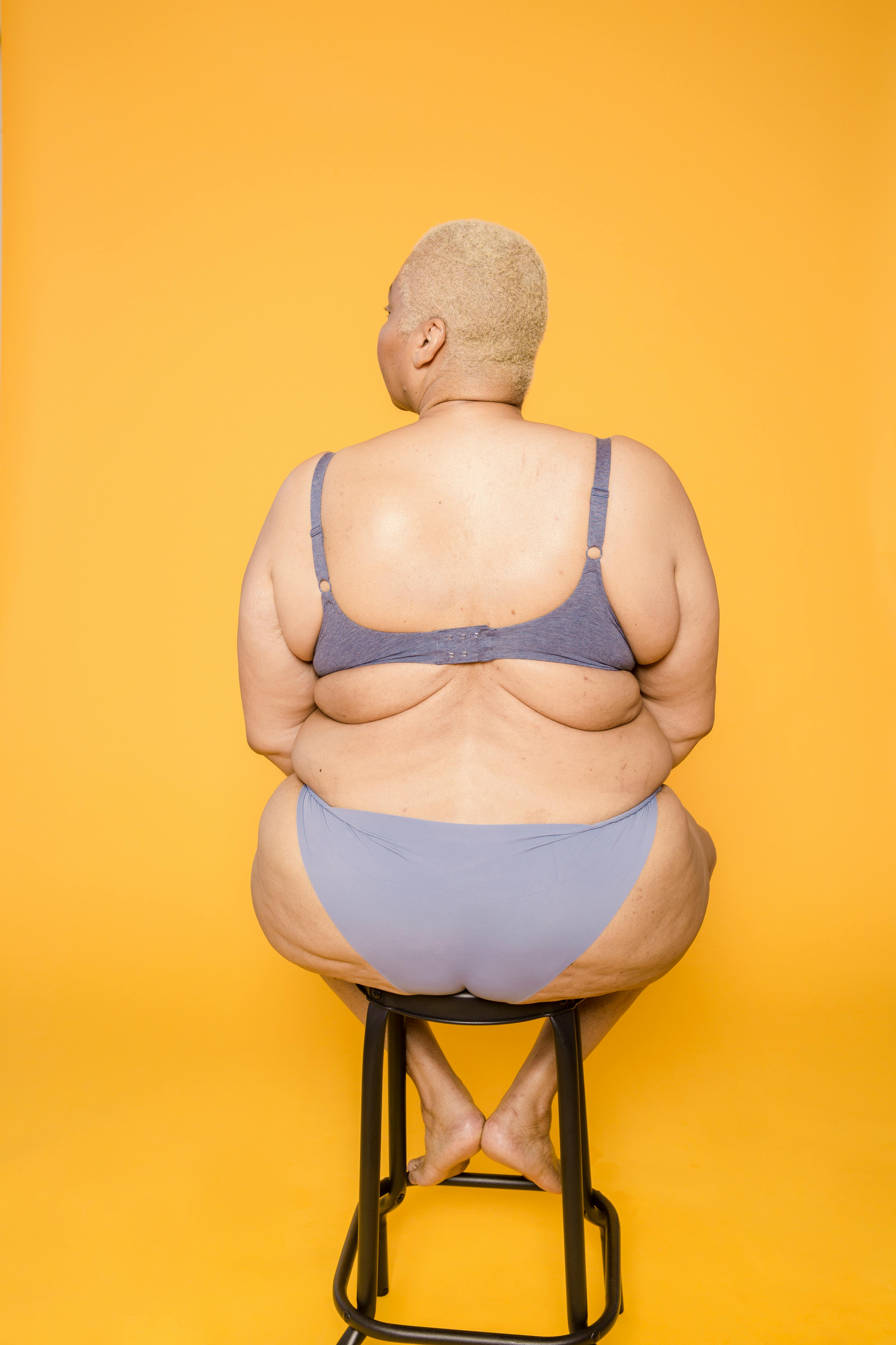 Premium Photo  Overweight woman in yellow panties rub coffee body