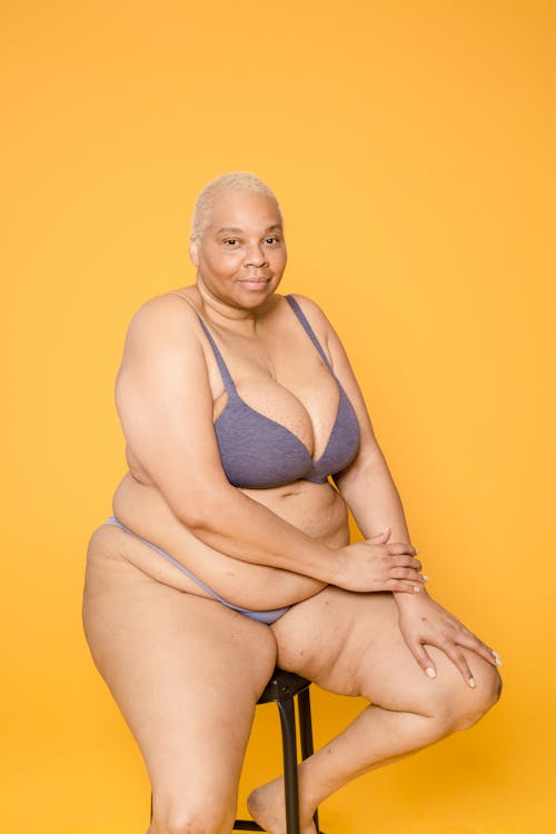 Woman Wearing Underwear Sitting on a Stool · Free Stock Photo