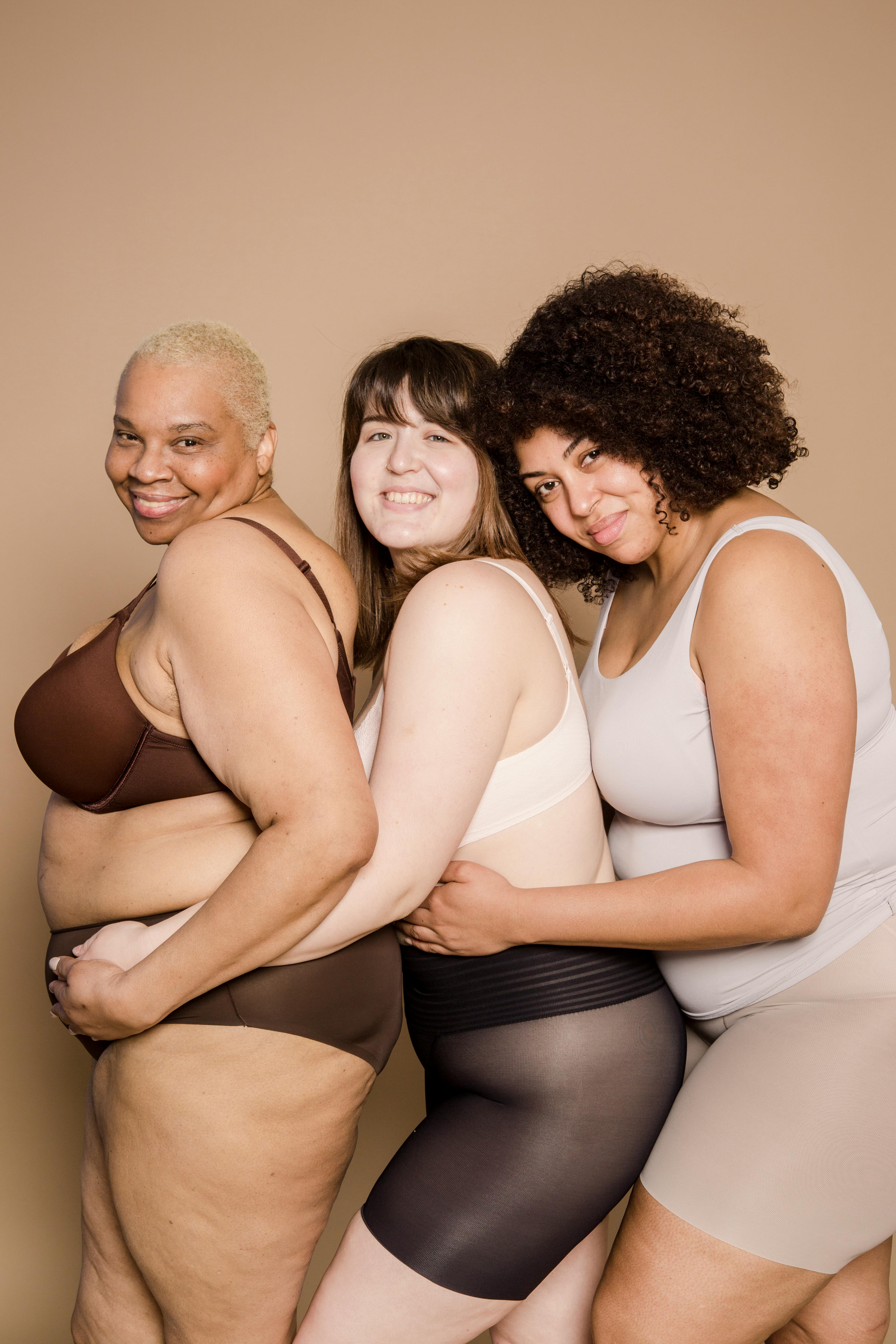 Positive diverse overweight women in underwear in studio · Free Stock Photo
