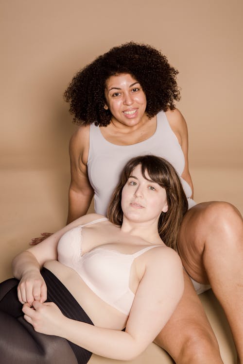 Free Cheerful plump multiethnic women in underwear Stock Photo