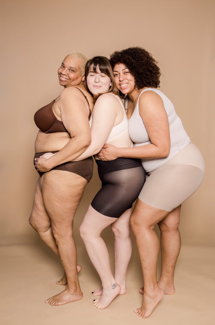 Smiling Diverse Overweight Women In Underwear