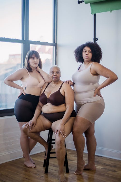 Diverse overweight women in underwear