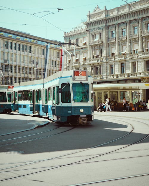Free White and Green Tram on Road Stock Photo