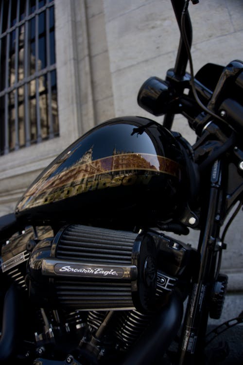 Black and Yellow Motorcycle on Road