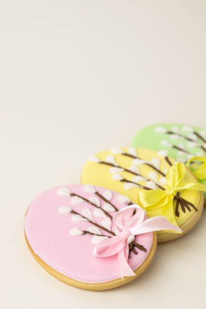 Pastel iced biscuits finished with ribbon bows — photo by Mike Murray on Pexels