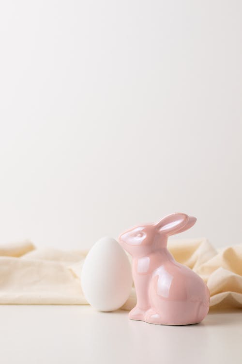 An Egg and a Bunny Shaped Figurine 