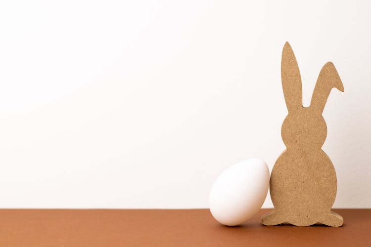 Bunny Cut Out  Cardboard Beside An Egg