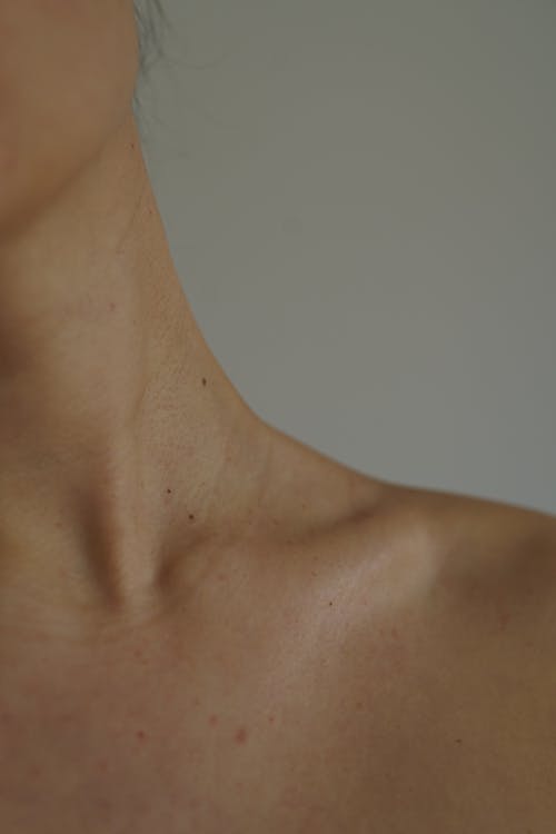 Free Close-up Shot of a Person's Neck Stock Photo