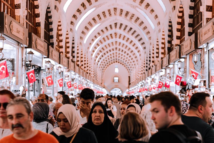 People Walking On A Bazzar