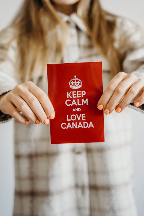 Безкоштовне стокове фото на тему «блондинка, вертикальні постріл, день канади»