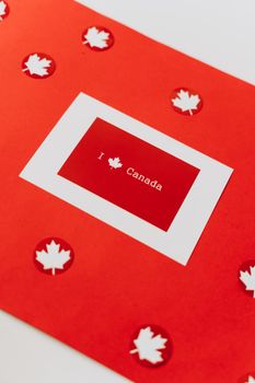 Artistic red card with maple leaves celebrating Canadian patriotism and decoration.