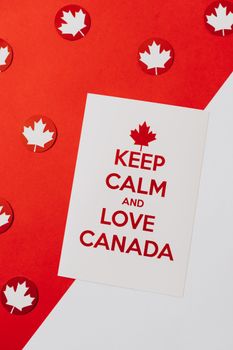 Red and white Canada-themed card with maple leaves and 'Keep Calm and Love Canada' text.