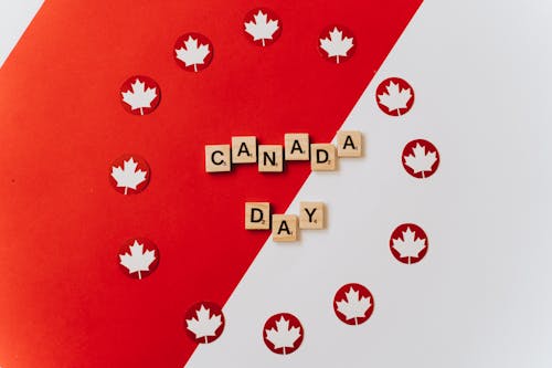 Scrabble Pieces on Canadian Flag