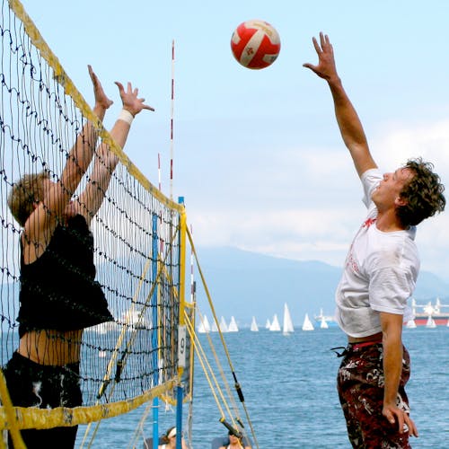 Photo of Men playing Volleyball