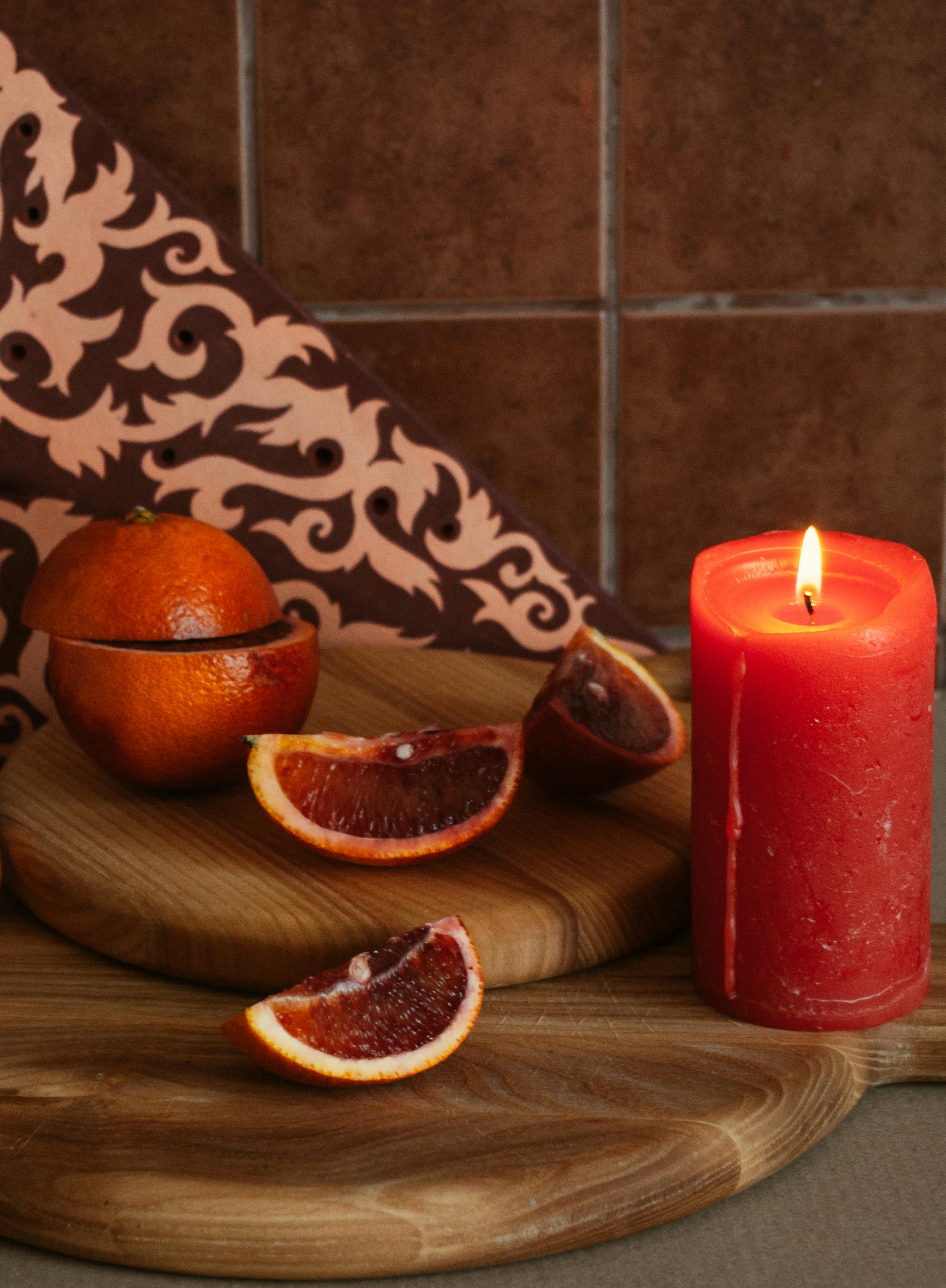 Fresh Sliced Citrus Fruits On Cutting Board With Wooden Squeezer Stock  Photo, Picture and Royalty Free Image. Image 54964192.