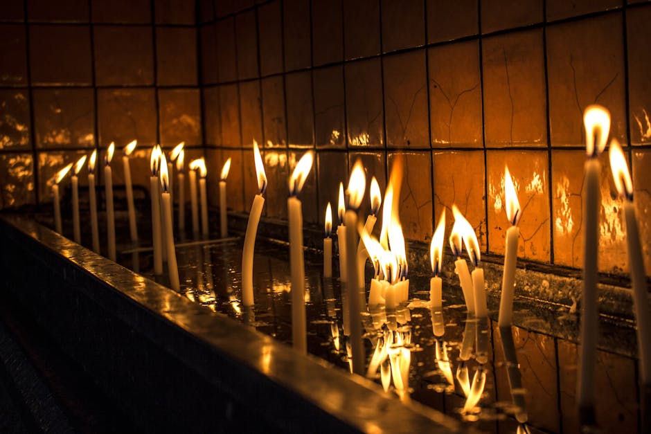 Lighted Candles on a Dark Room · Free Stock Photo
